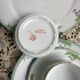 Set of 2 antique porcelain chocolate services.