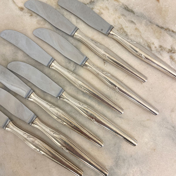 Series of 8 dessert knives, silver metal