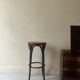 High bistro stool in turned wood and new cane, 1950
