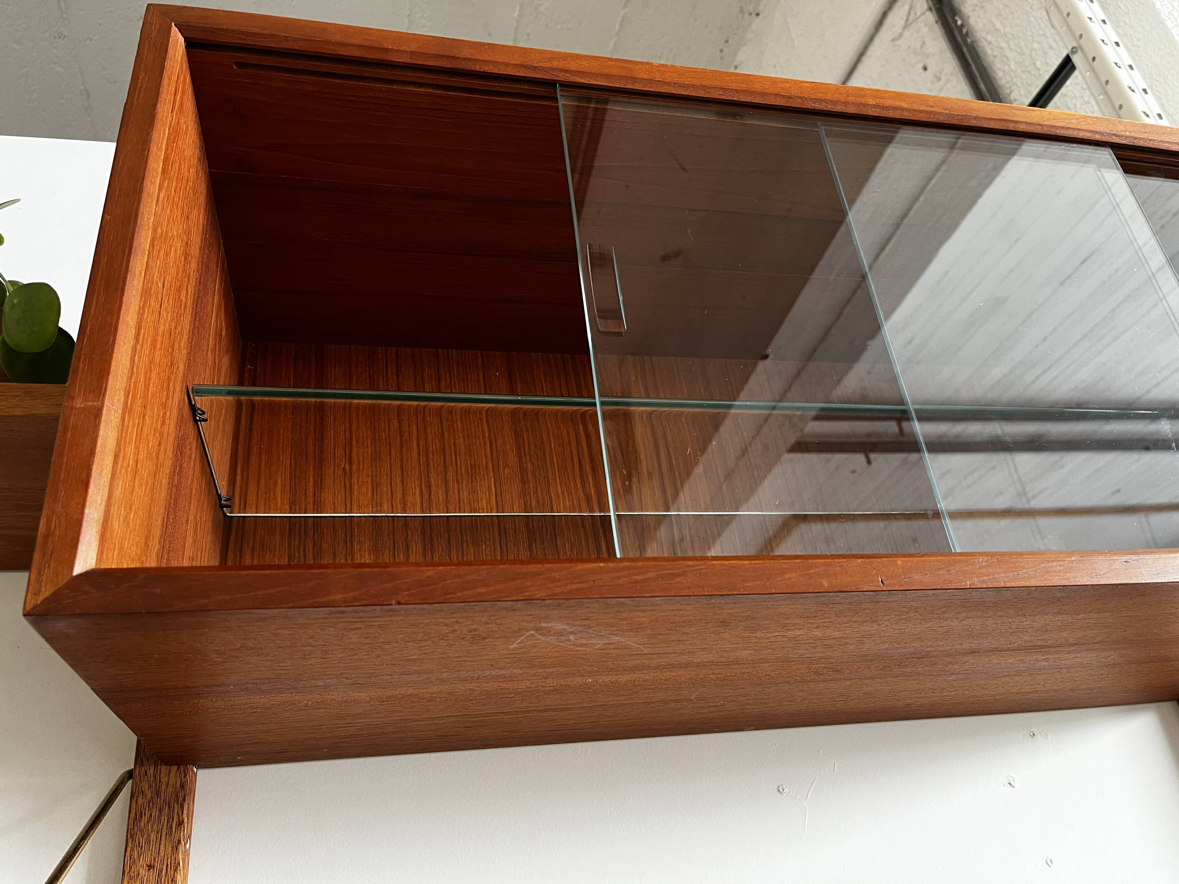 A wall unit with 4 compartments by Poul Cadovius, Denmark, 1960s.