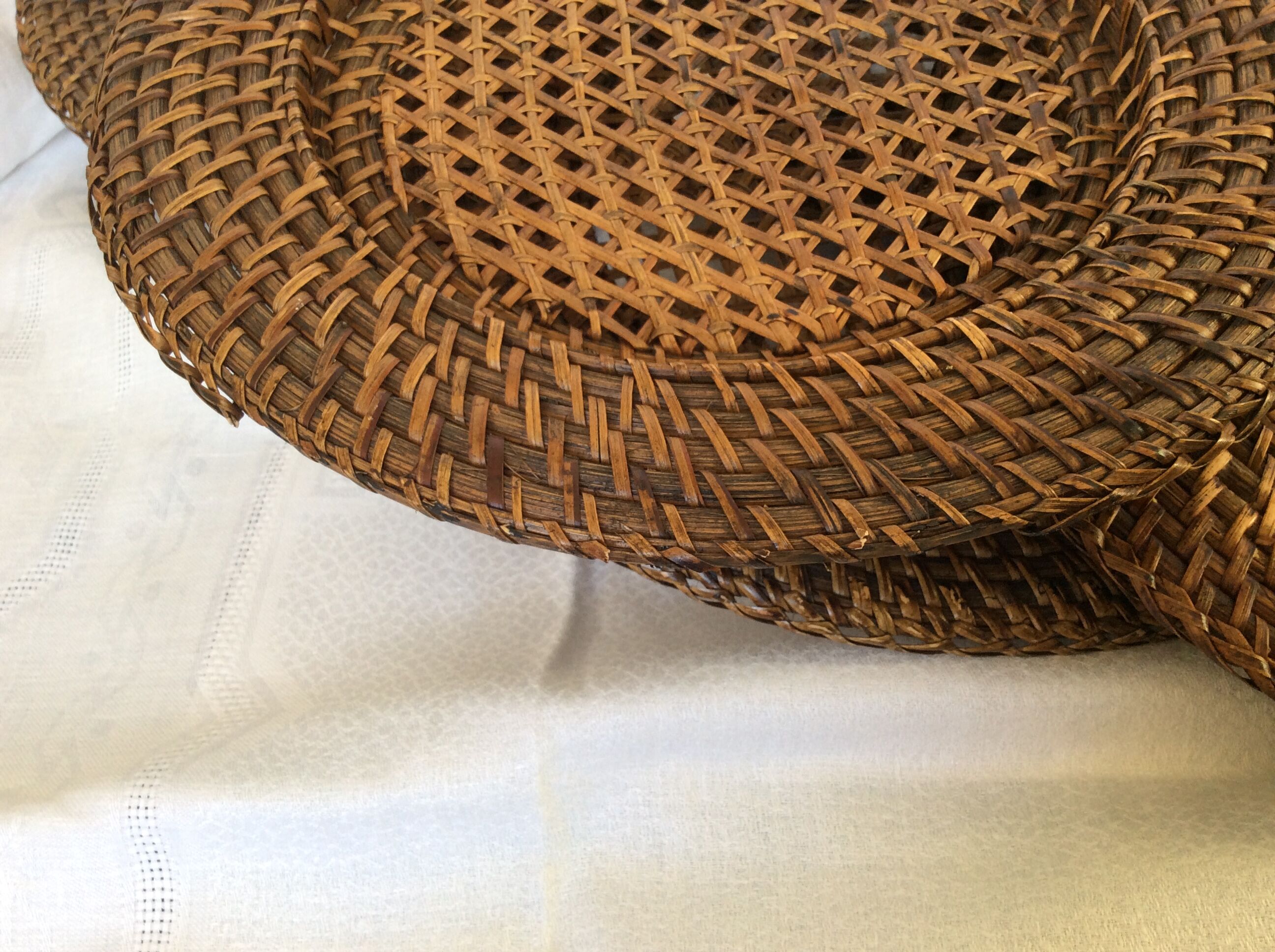 Six rattan under-plates, basketry, wicker