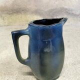 Blue glazed ceramic pitcher