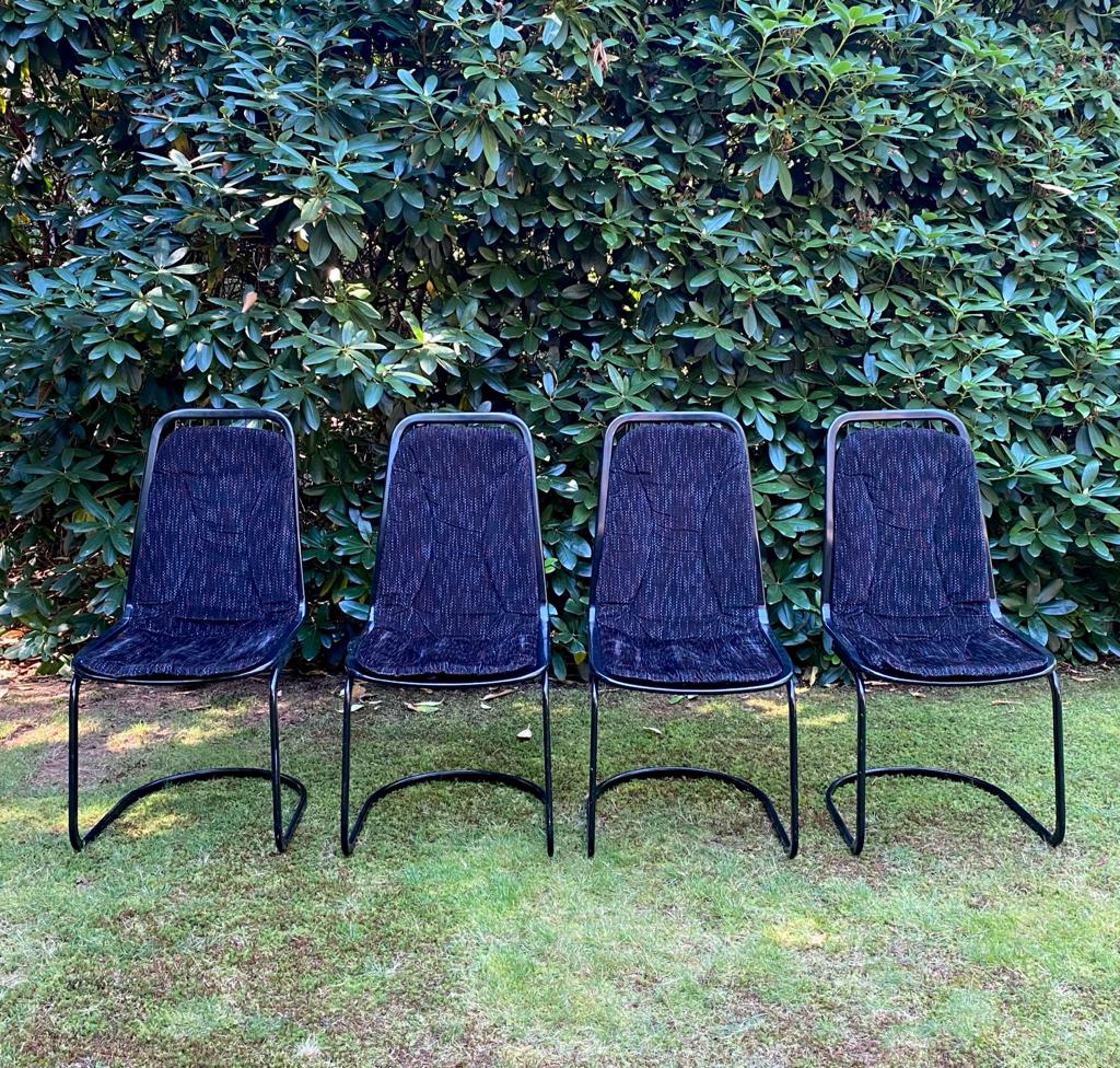 Set of four black highback dining chairs,  1970s