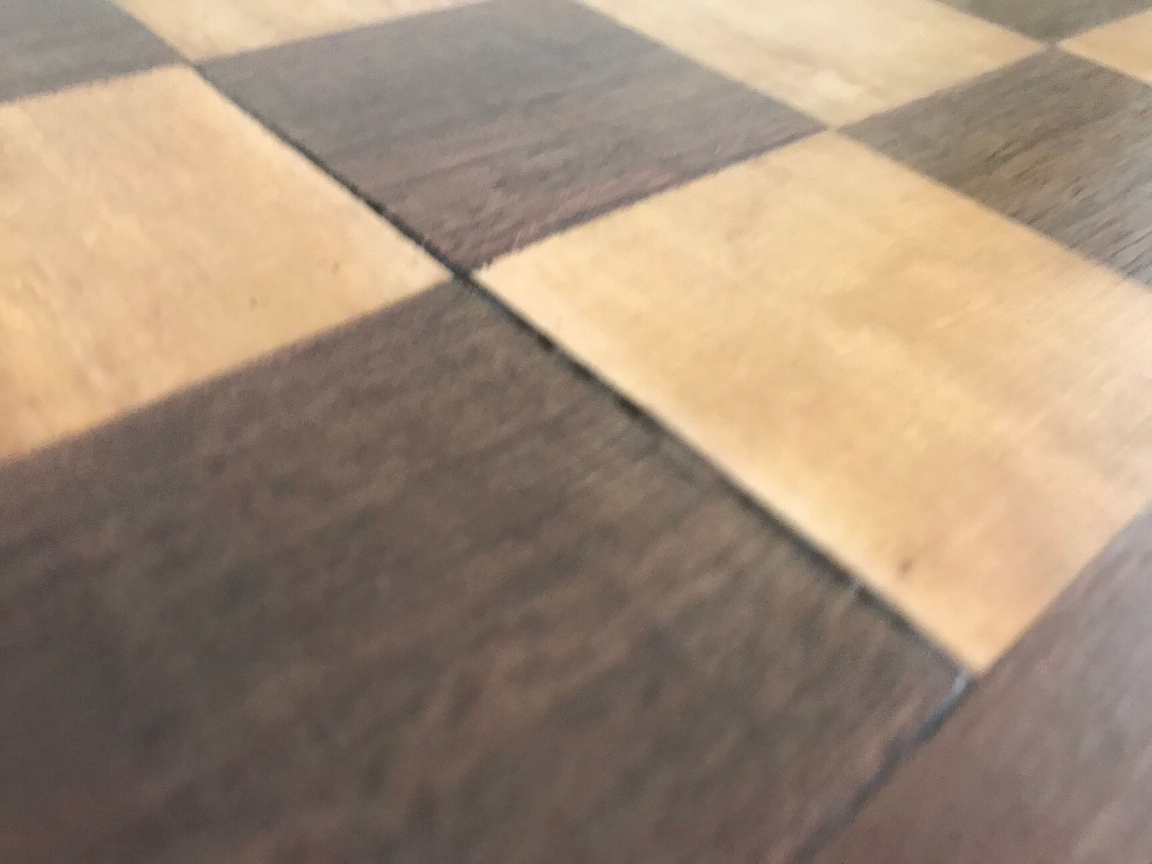 Side table with checkerboard pattern circa 1950