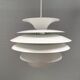 Hanging lamp with multiple layers of shades, by Junge/Vitrika