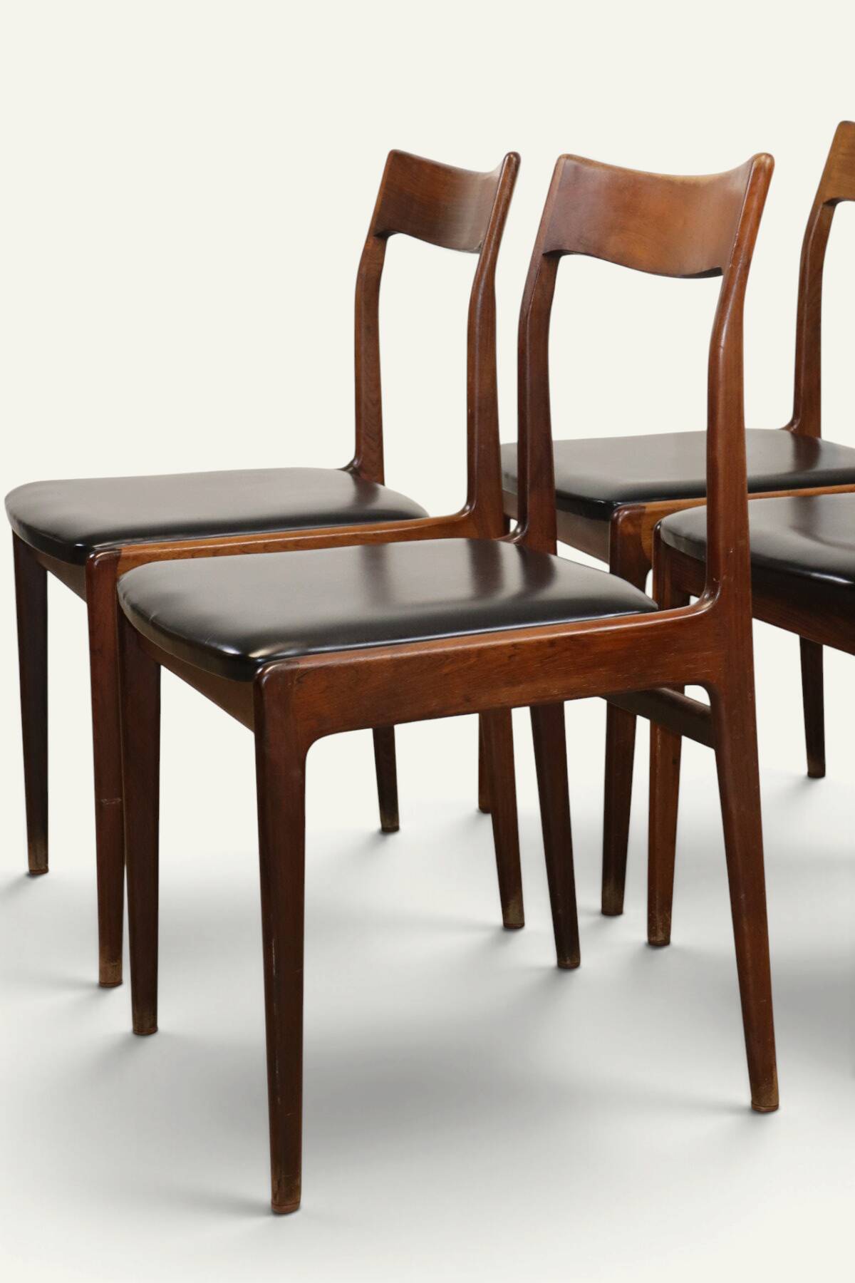 Set of 4 vintage teak and black faux leather chairs – 1960s