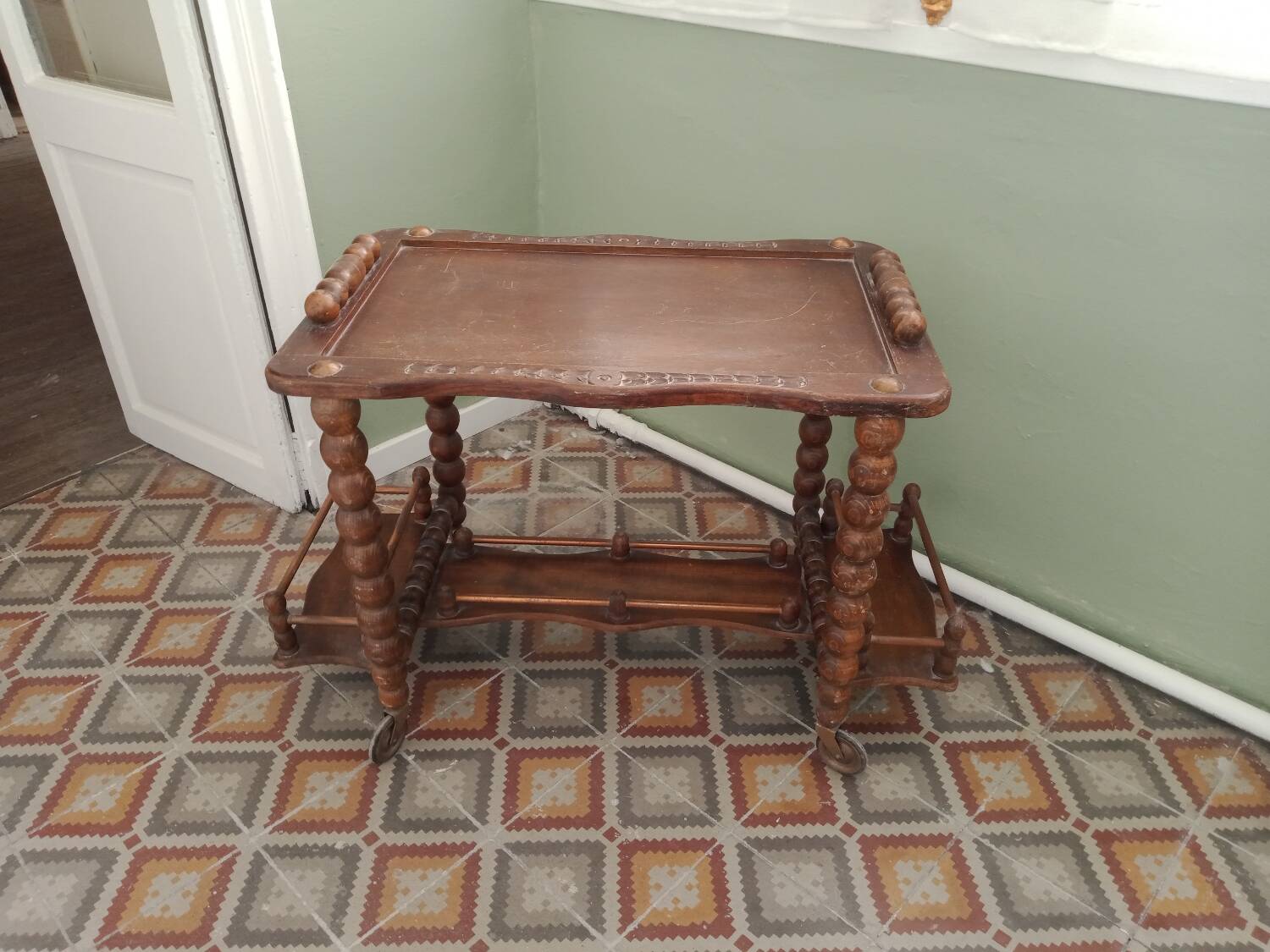 Wooden trolley on wheels