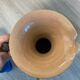 Scarified ceramic vase with twisted handle - African style