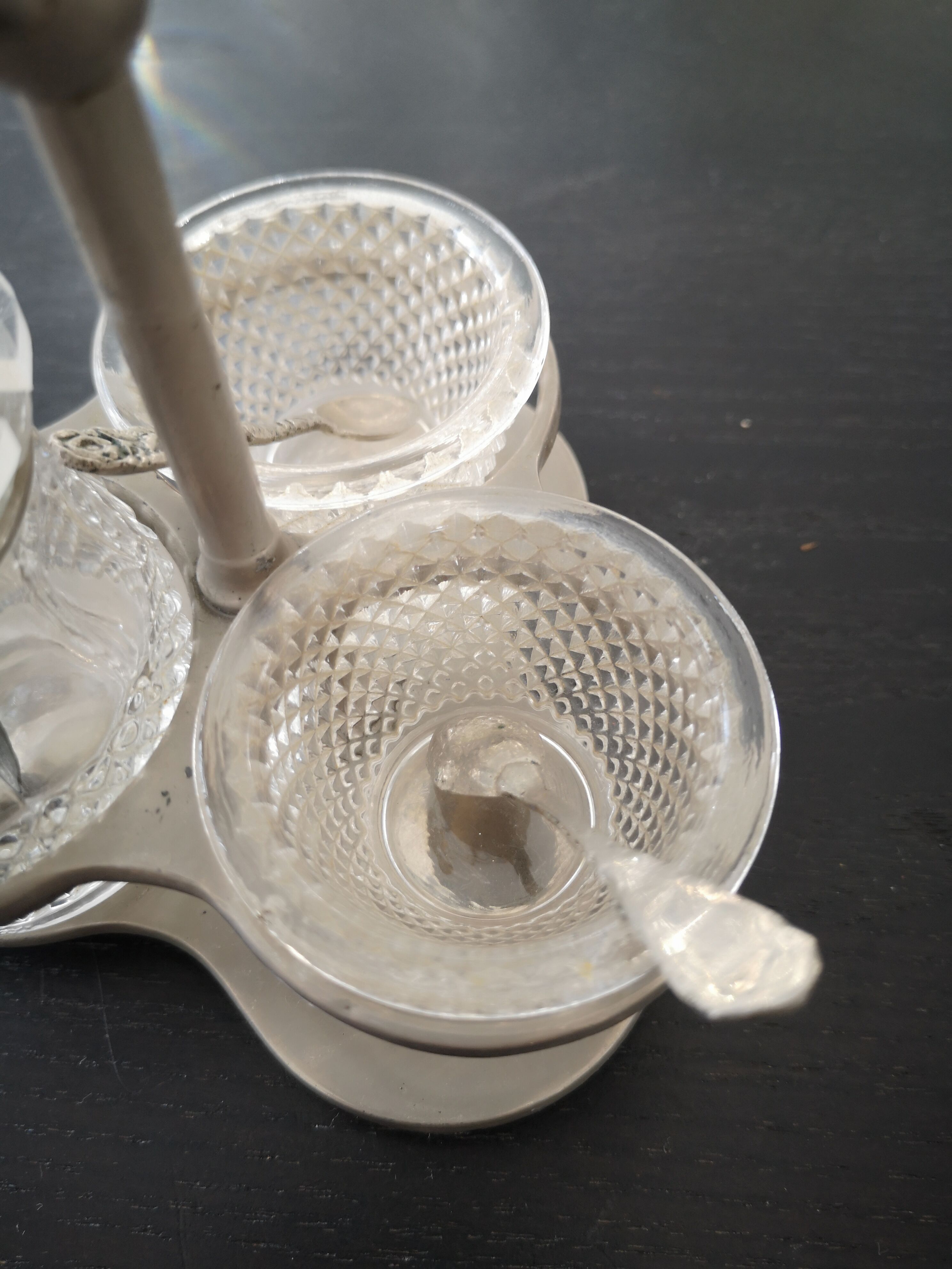 Salt, poivier, mustard with spoons