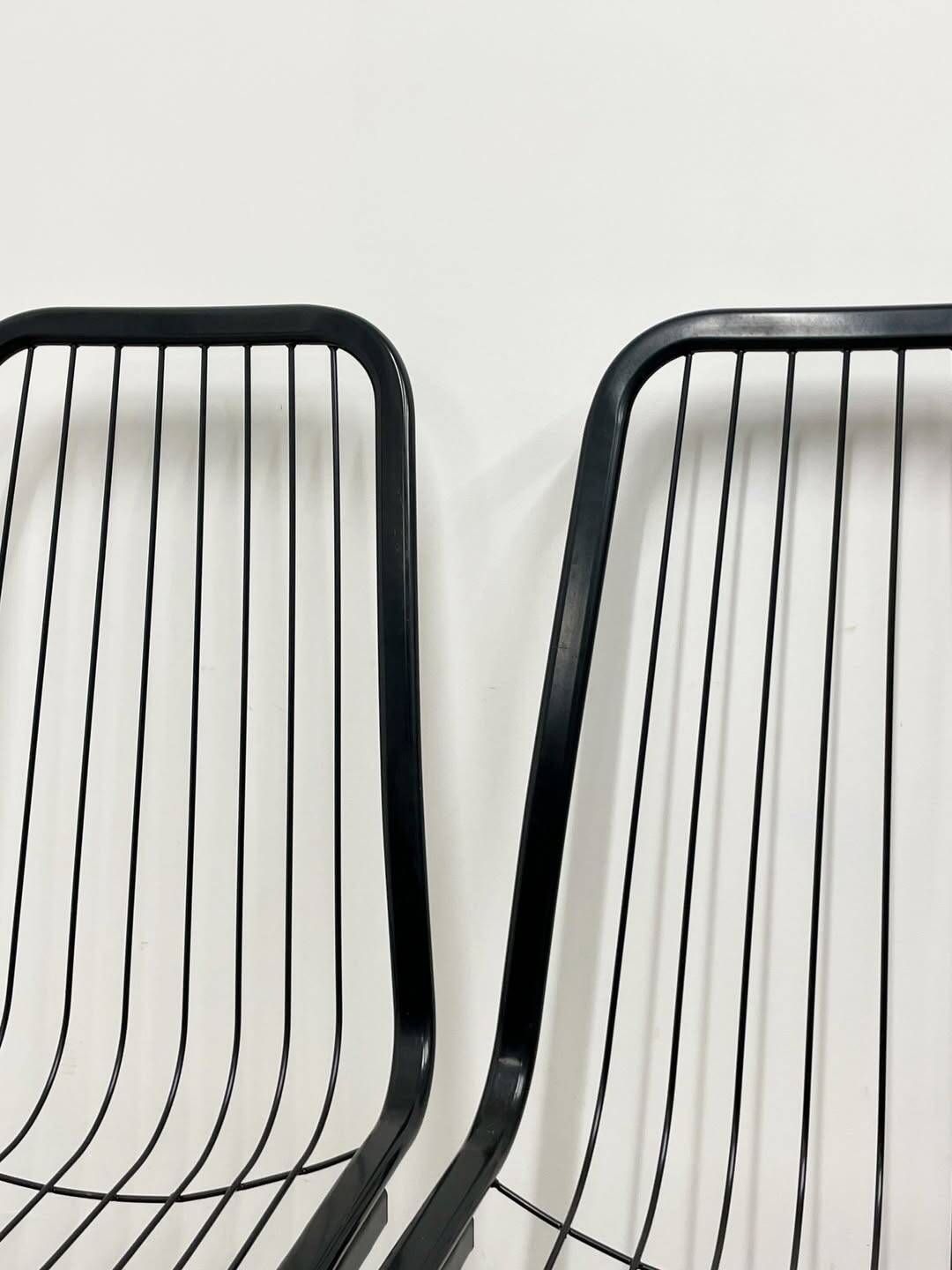 4 black wire metal chairs