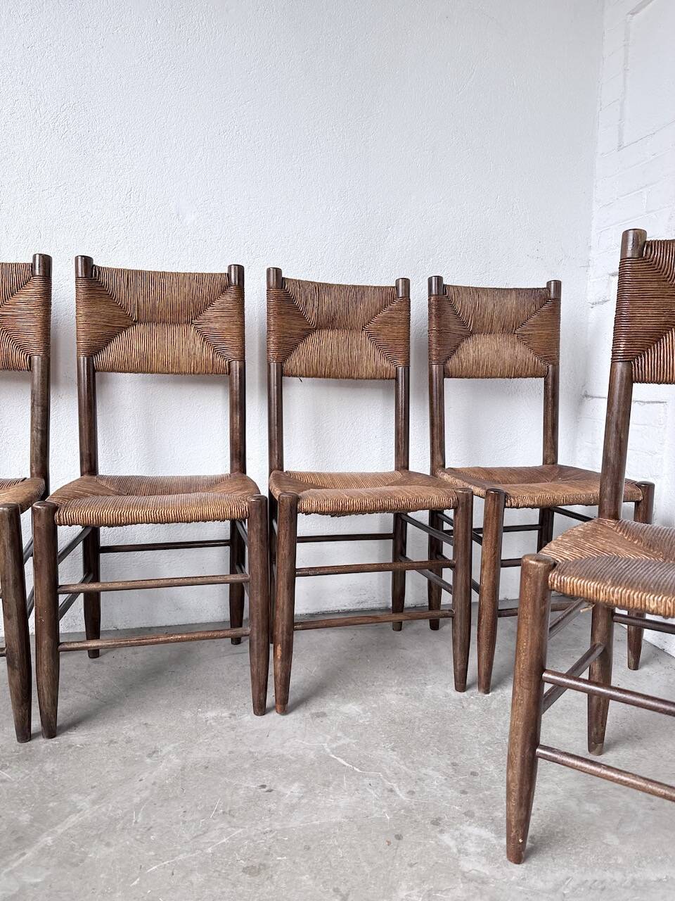 Set of 6 straw and oak Beauche chairs.