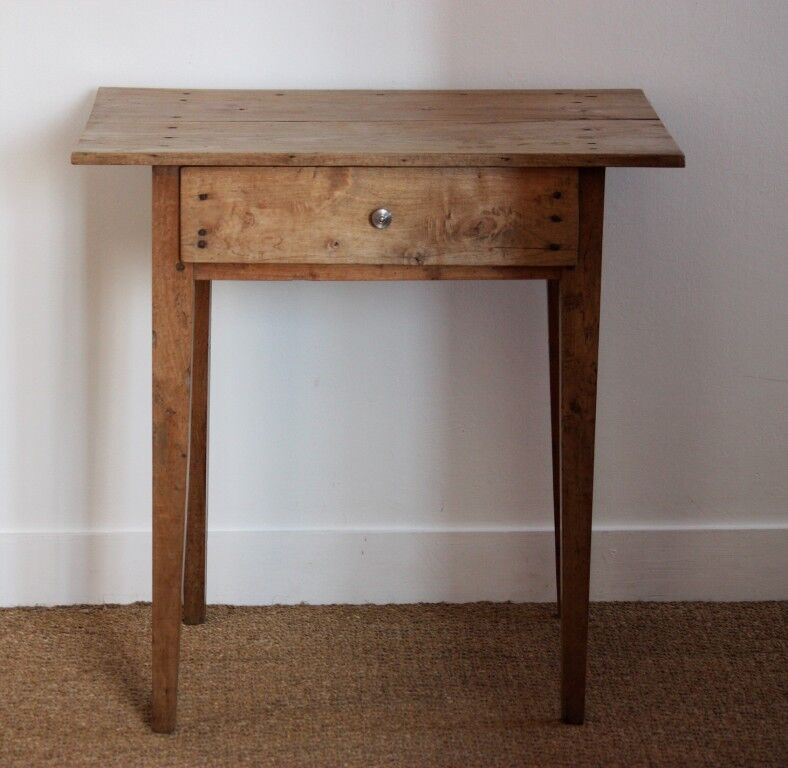 Wooden table with drawer