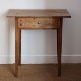 Wooden table with drawer