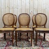 Set of 6 Louis XVI medallion chairs with caning.
