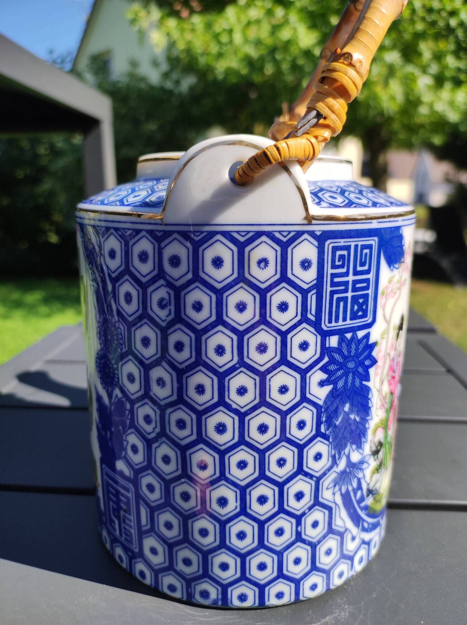 Asian, Japanese fine porcelain teapot with woven bamboo handle, vintage 50s