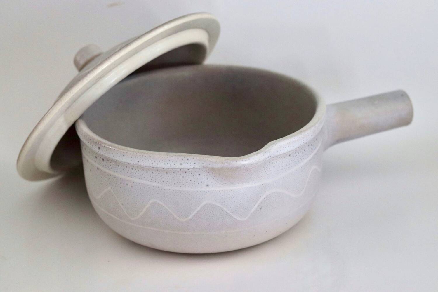 Enamelled terracotta saucepan