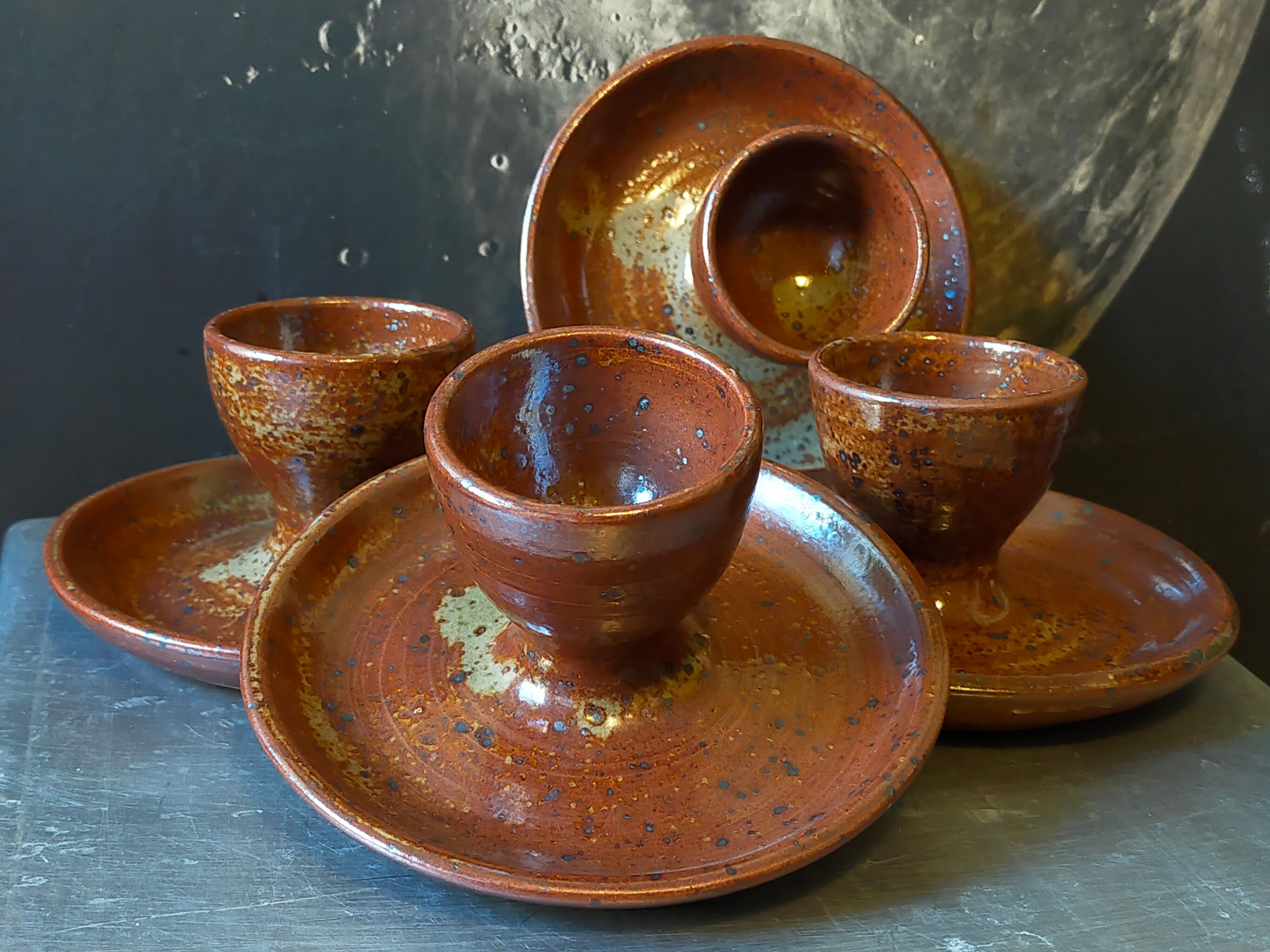 Four pyrite stoneware shells