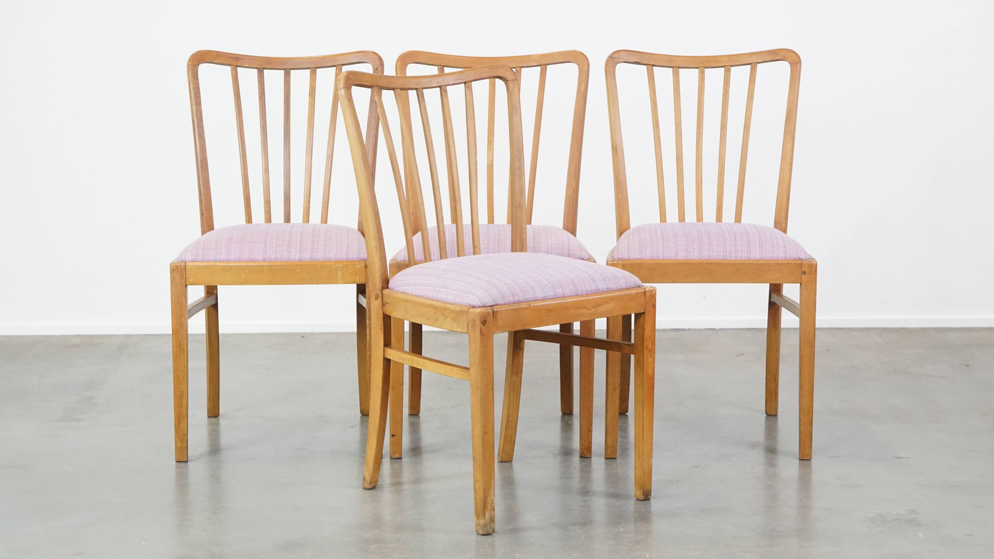 Set of 4 vintage Danish design dining chairs from the 1970s with light purple fabric seats