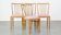 Set of 4 vintage Danish design dining chairs from the 1970s with light purple fabric seats