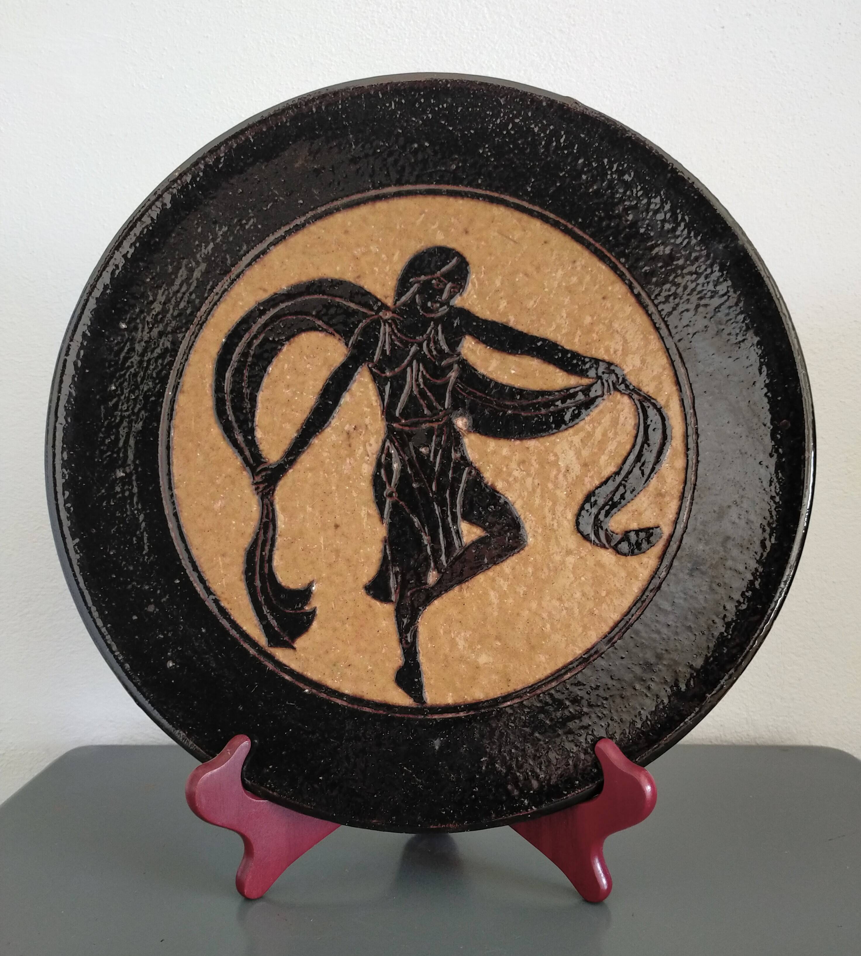 Glazed earthenware dish from Dauphiné signed A.M. Faure 1953
