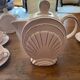 1930s art deco coffee service in pale pink earthenware with shell decoration