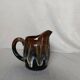Flamed stoneware jug