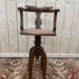 Fauteuil de coiffeur en cannnage Paul Tournay