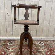 Fauteuil de coiffeur en cannage Paul Tournay