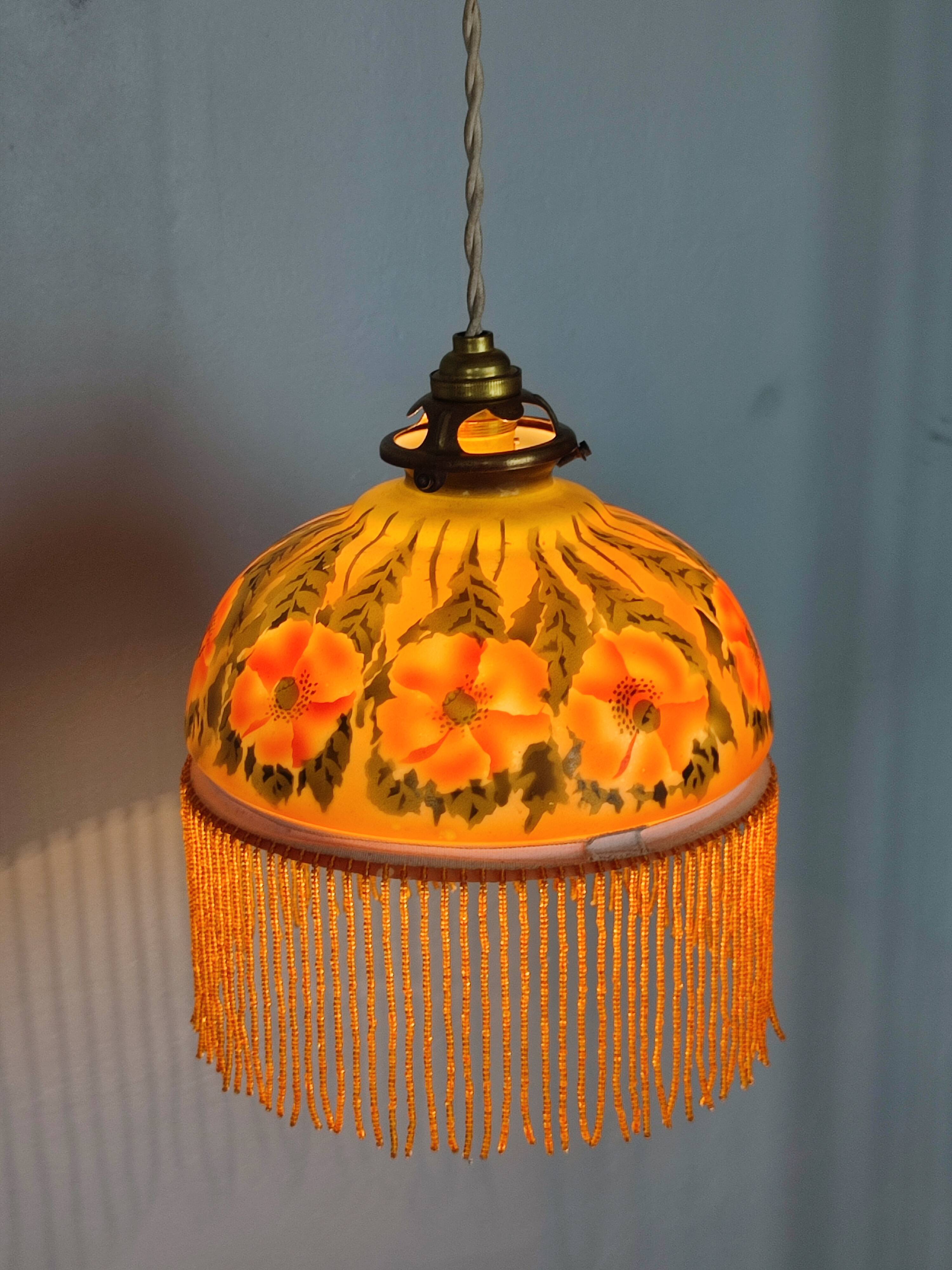 Old opaline and its tassels hanging lamp