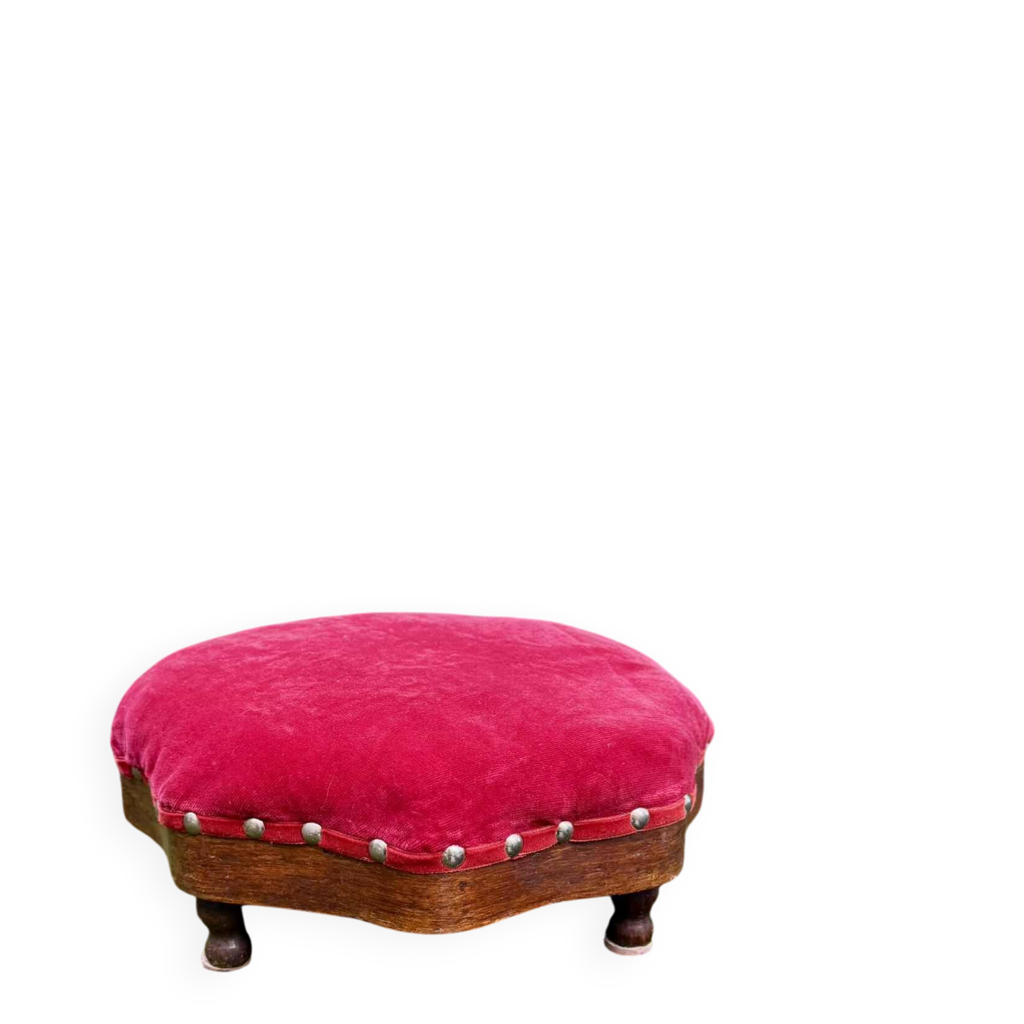 Red velvet footstool in the Louis XV style