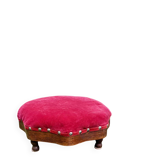 Red velvet footstool in the Louis XV style