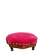 Red velvet footstool in the Louis XV style