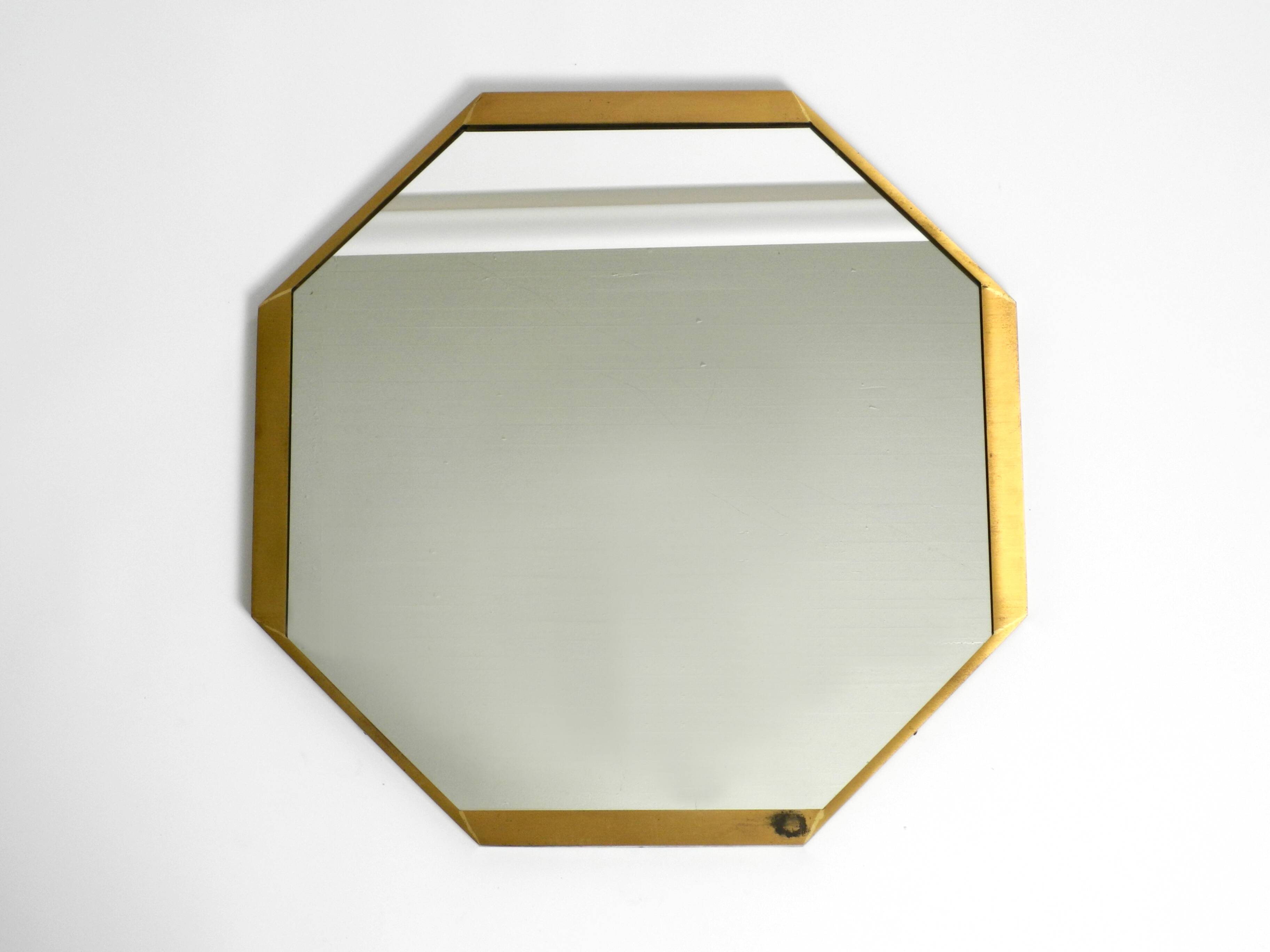 Large unusual Italian Mid Century Modern octagonal brass wall mirror