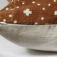 Housse de coussin en bogolan couleur rouille