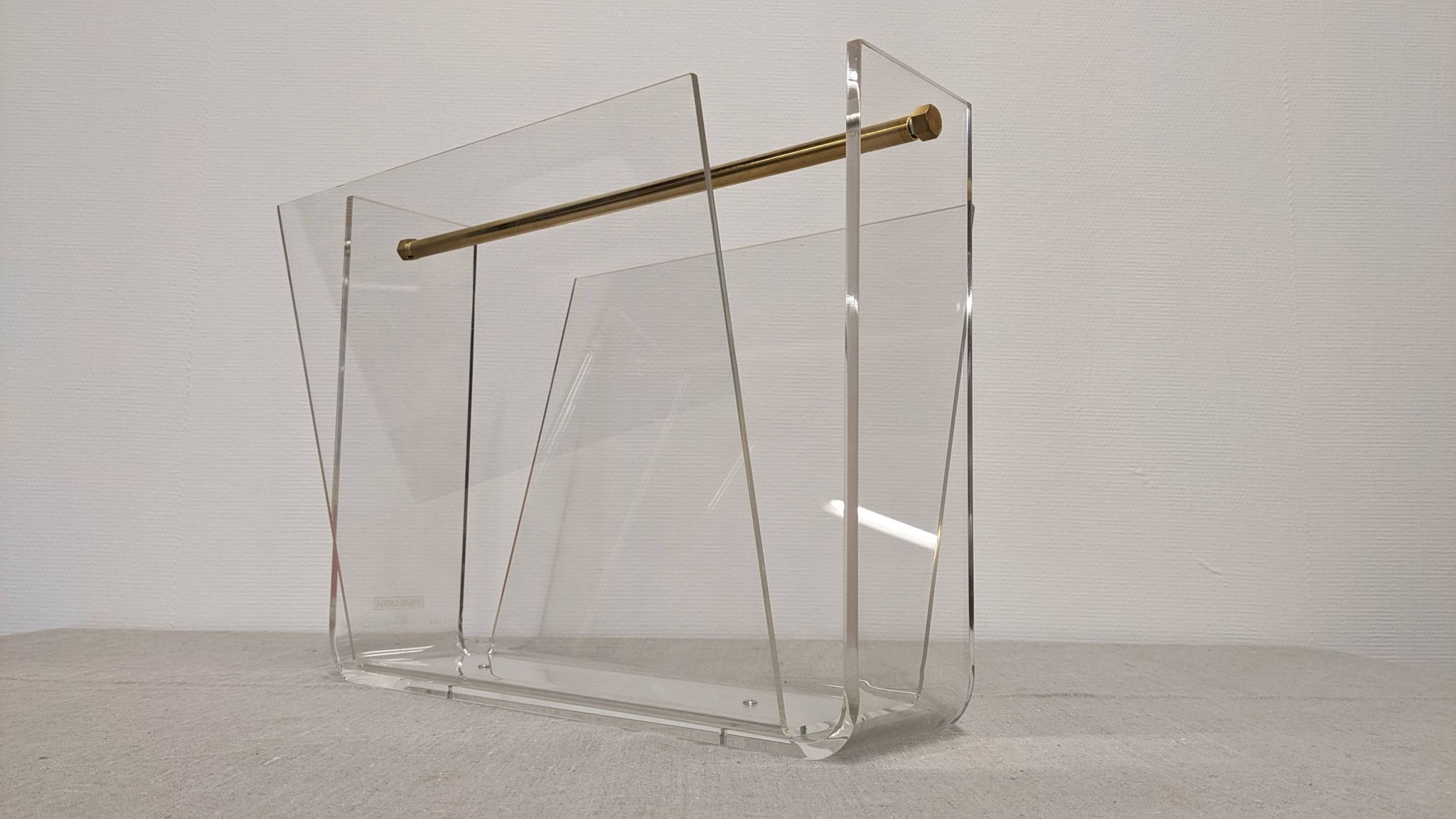 Acrylic magazine rack by David Lange, France circa 1970.