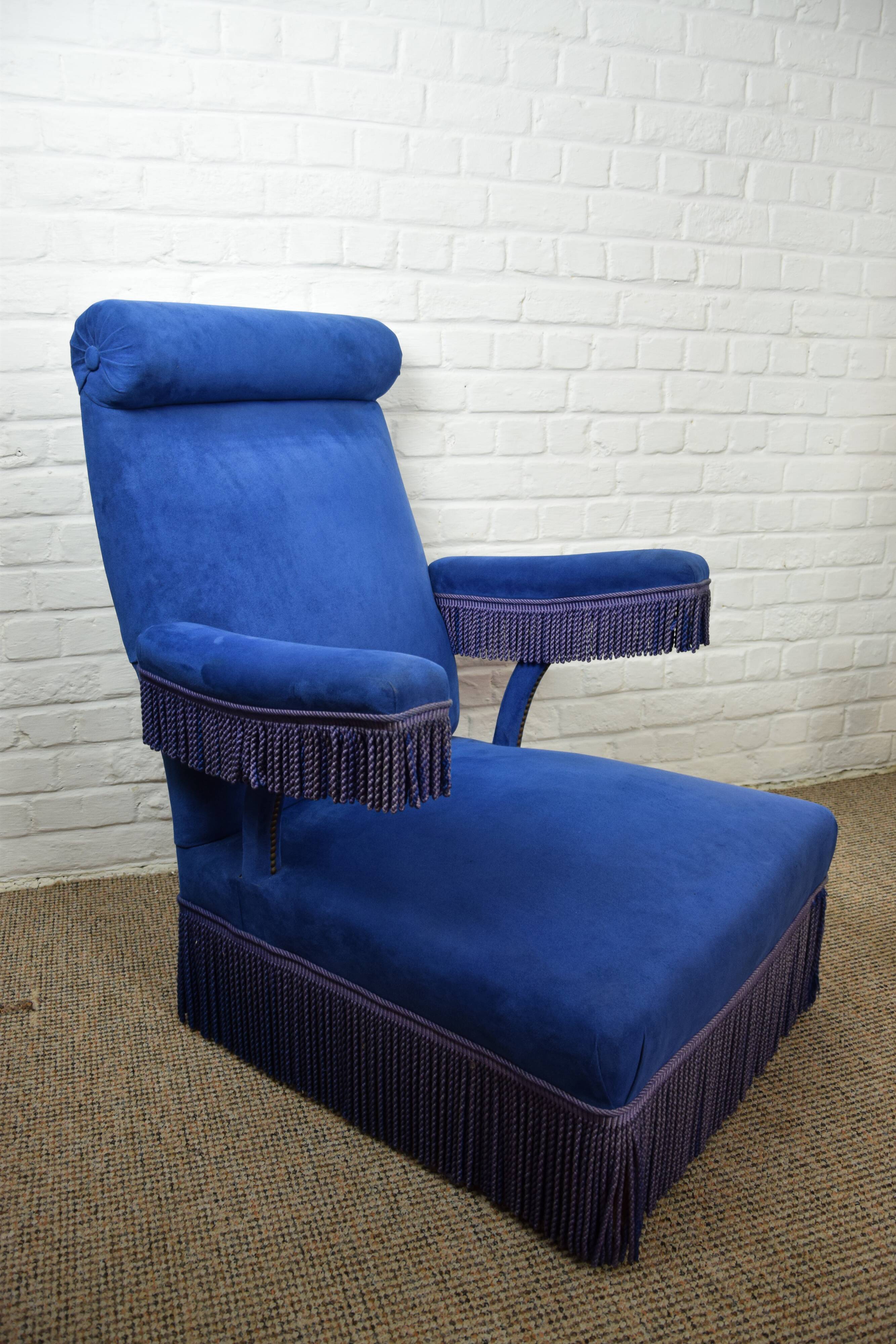 Blue velvet armchair