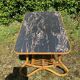 Table basse vintage en rotin et Formica