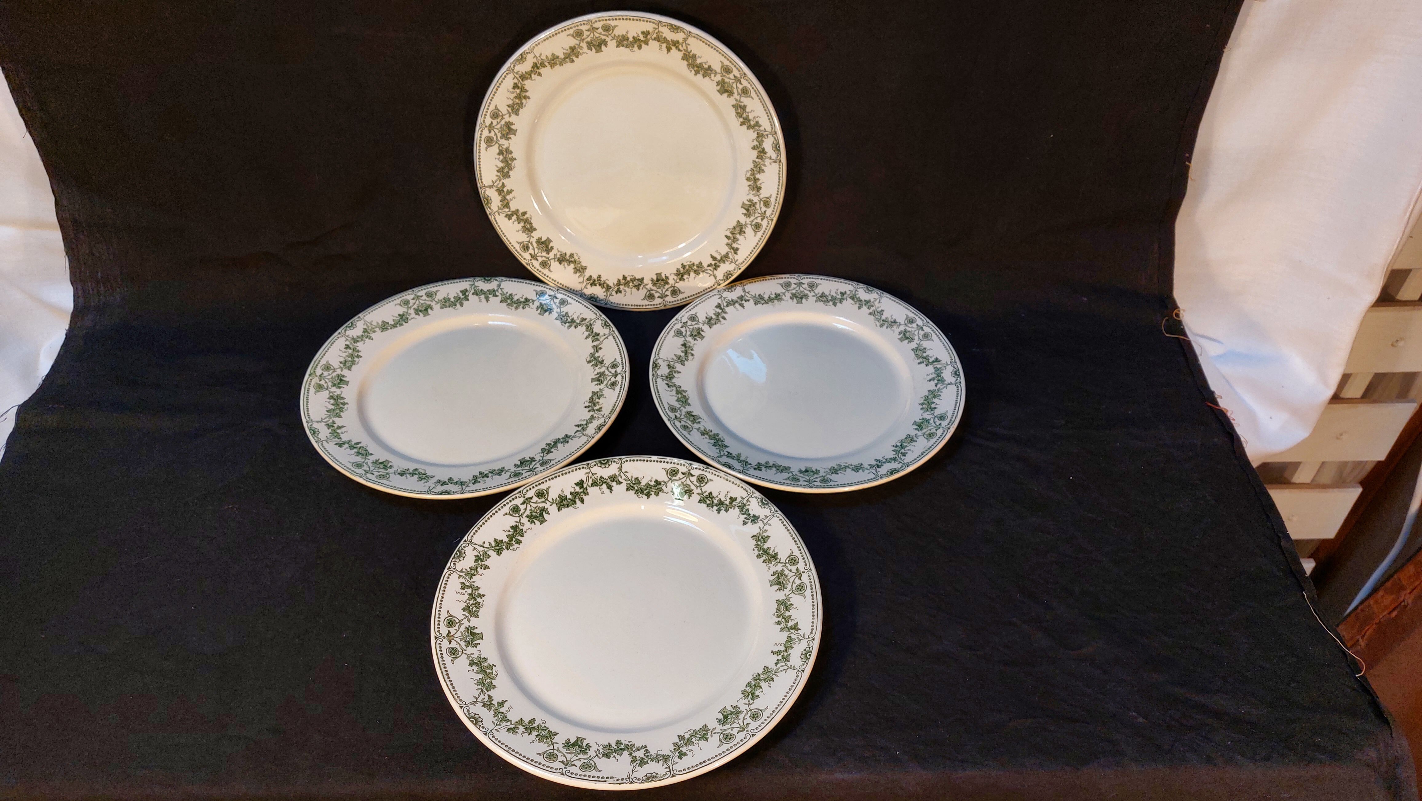 Set of 4 antique flat plates in half-porcelain from Badonviller
