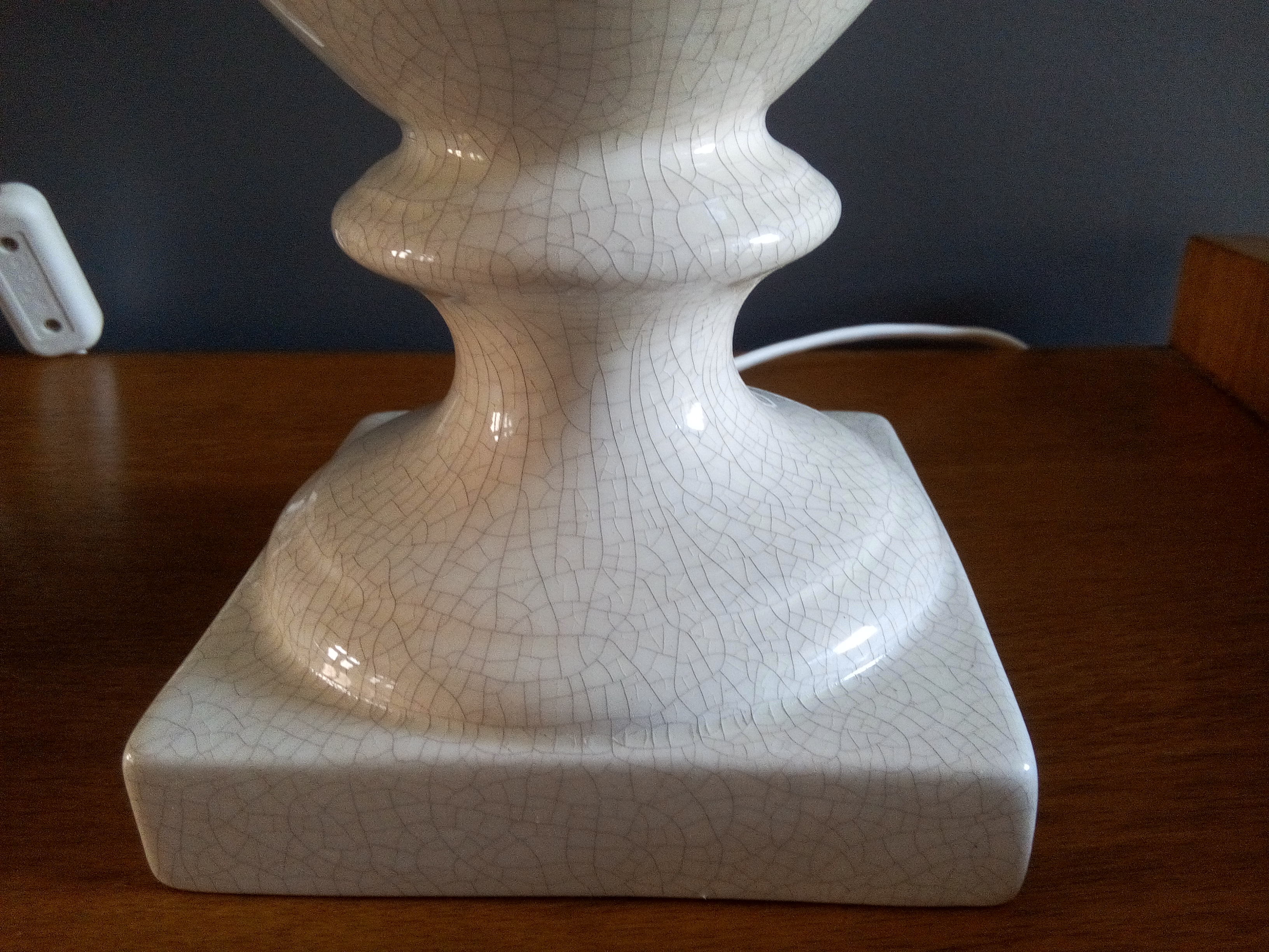 Pair of legs of cracked earthenware lamps