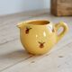 Vintage yellow ceramic milk jug