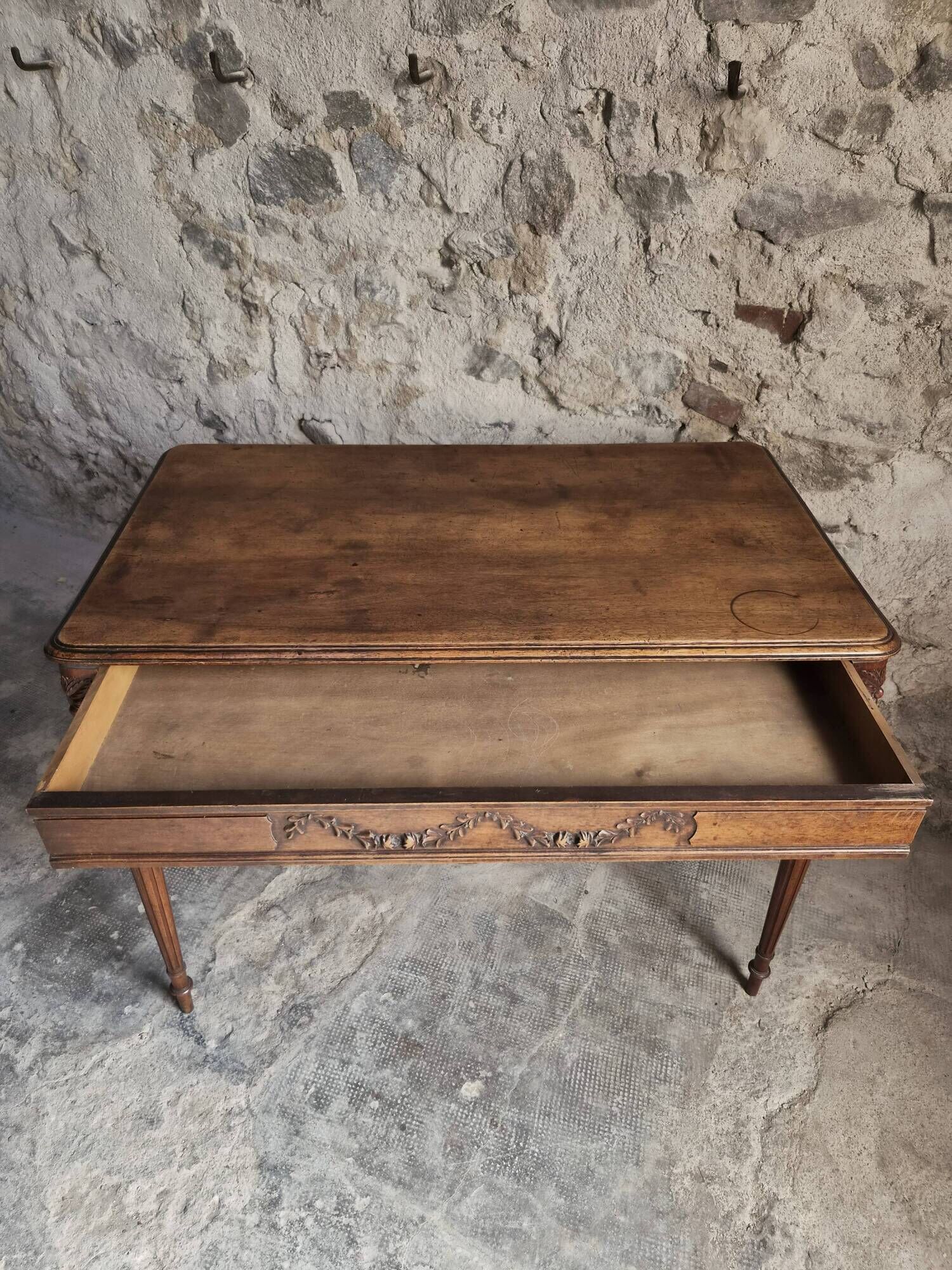 French antique writing desk in walnut, Louis XVI style, late 19th century, circa 1880–1900.
