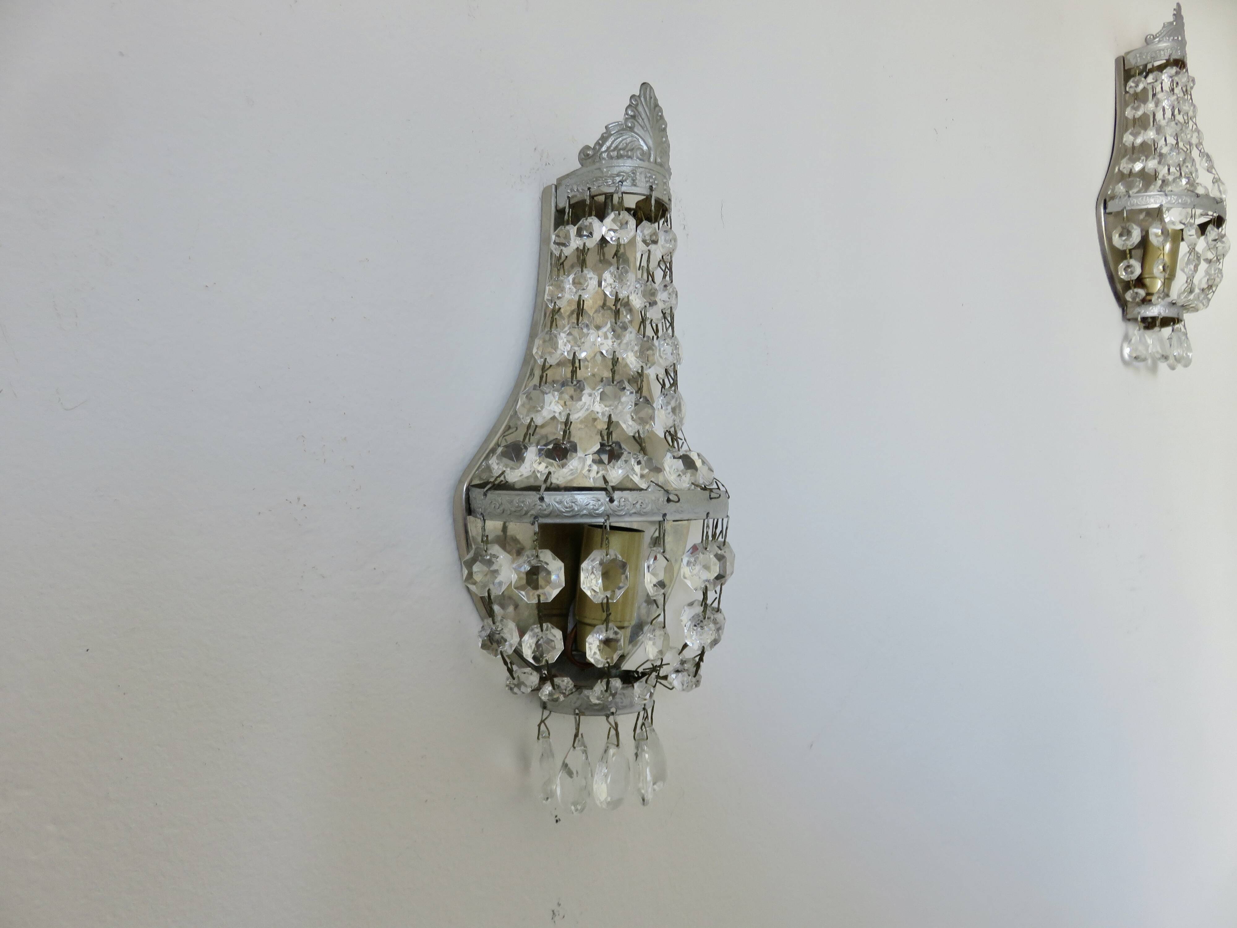 Pair of silver-plated balloon wall lights with pendants, circa 1970.