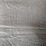 Bedspread in woven white cotton, single bed