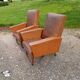 Paire de fauteuils vintage en skaï marron
