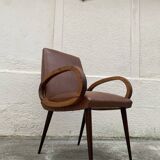 Mid-Century Scandinavian vintage retro armchair with oval armrests.