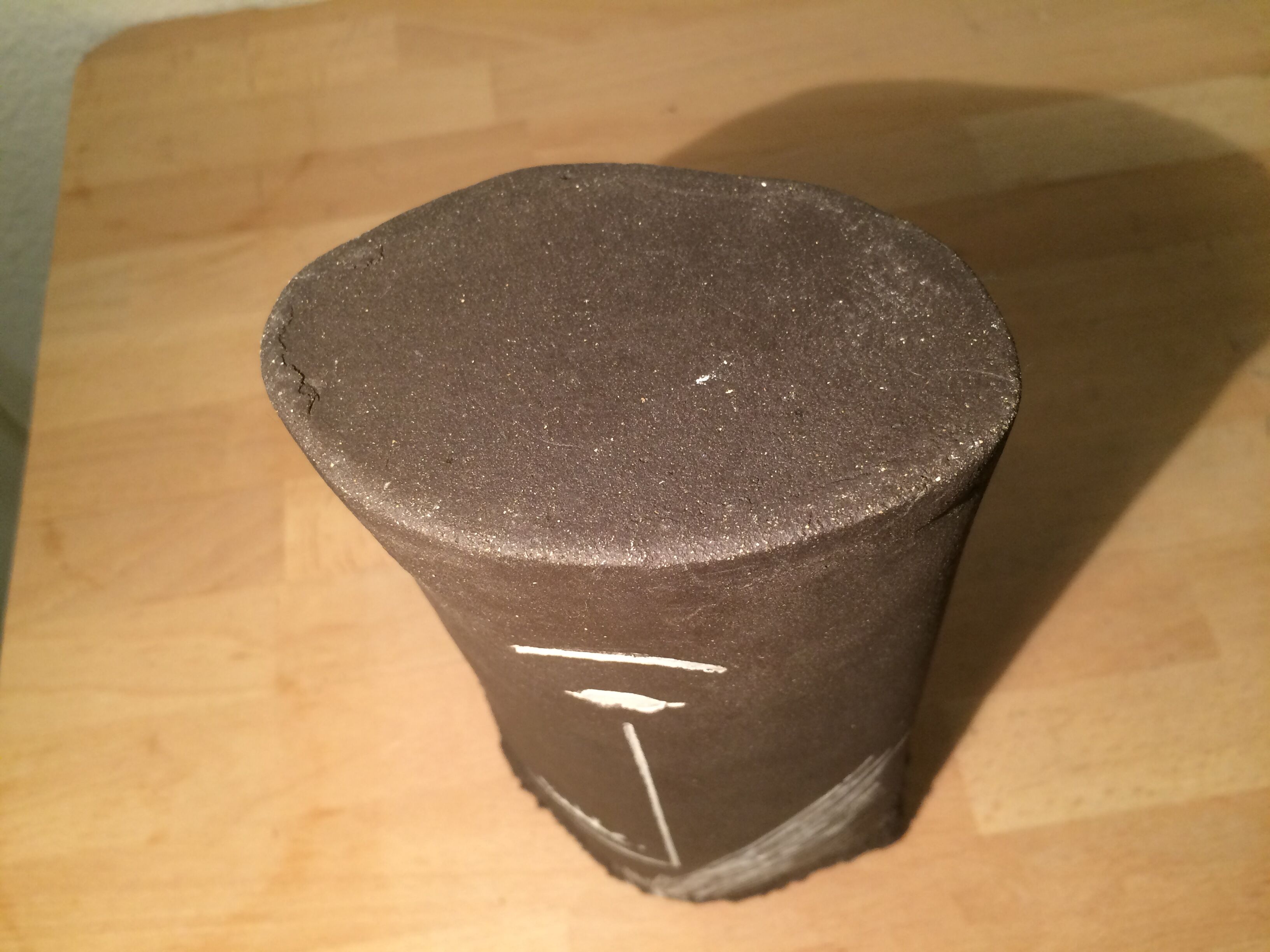 Ceramic vase face, black and white