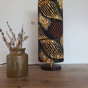 Tube lamp with wooden base and wax boho-ethnic fabric