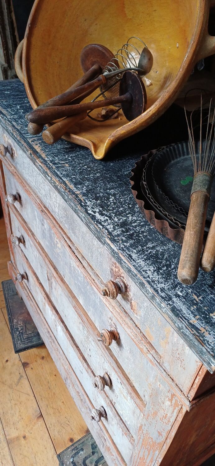 Antique piece of furniture with a grey patina.