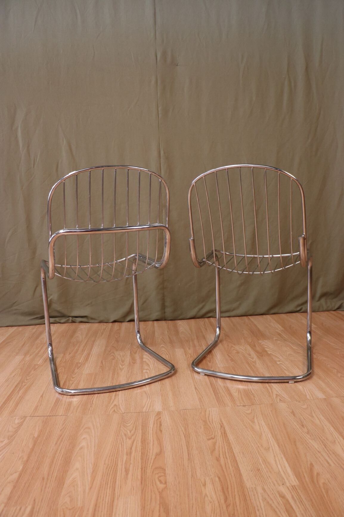 Series of 4 tubular steel chairs