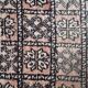 Vintage faded pink and black Berber rug